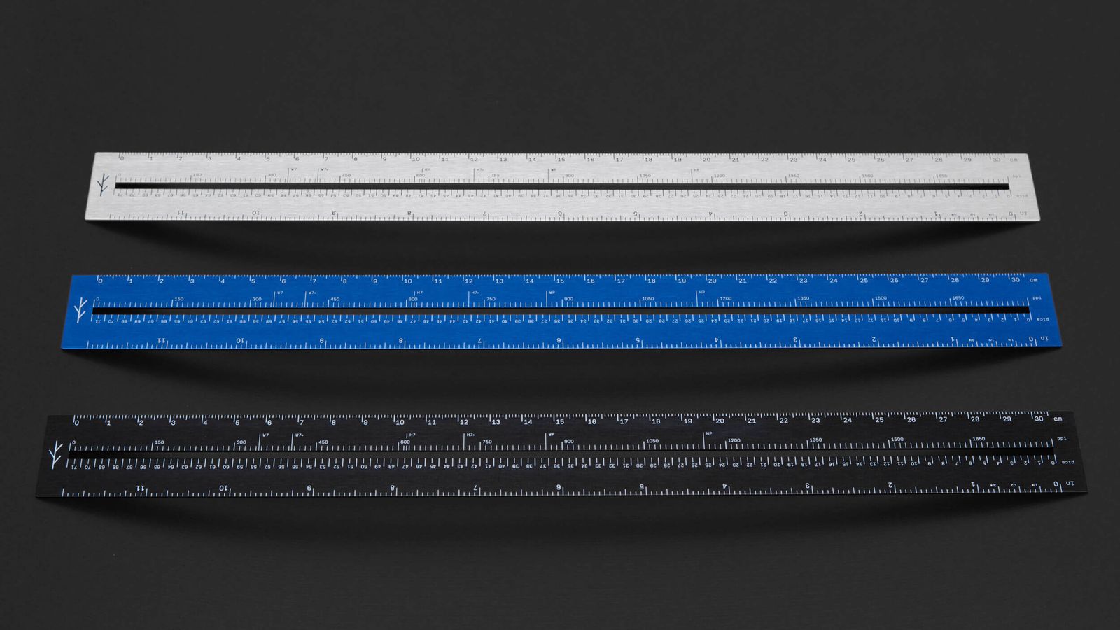 LindLund Alm ruler in black finish on a dark background