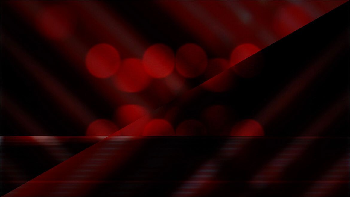 Overlapping streaks of warm orange and cool blue light from Times Square at night