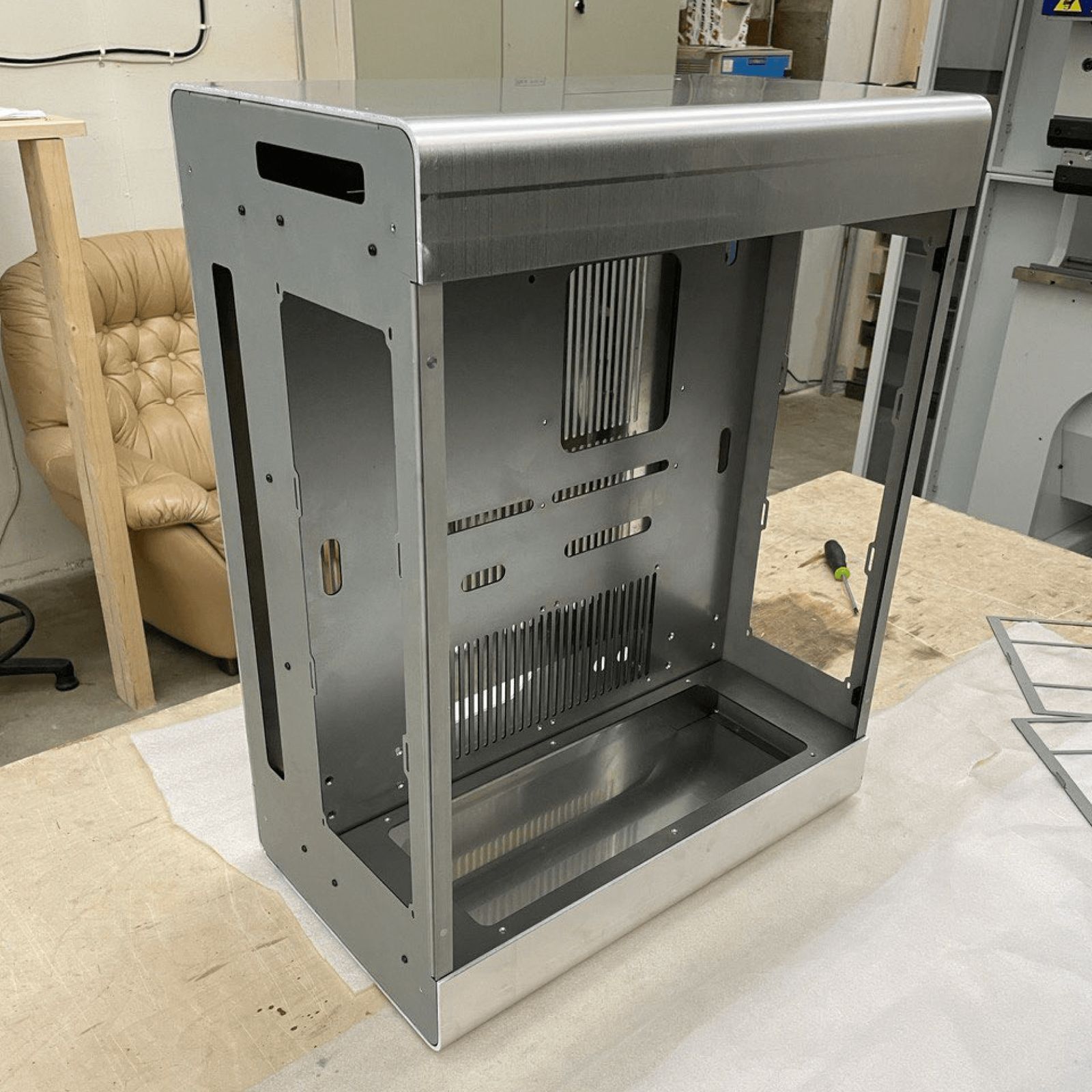 E32B case in raw unpainted metal before finishing