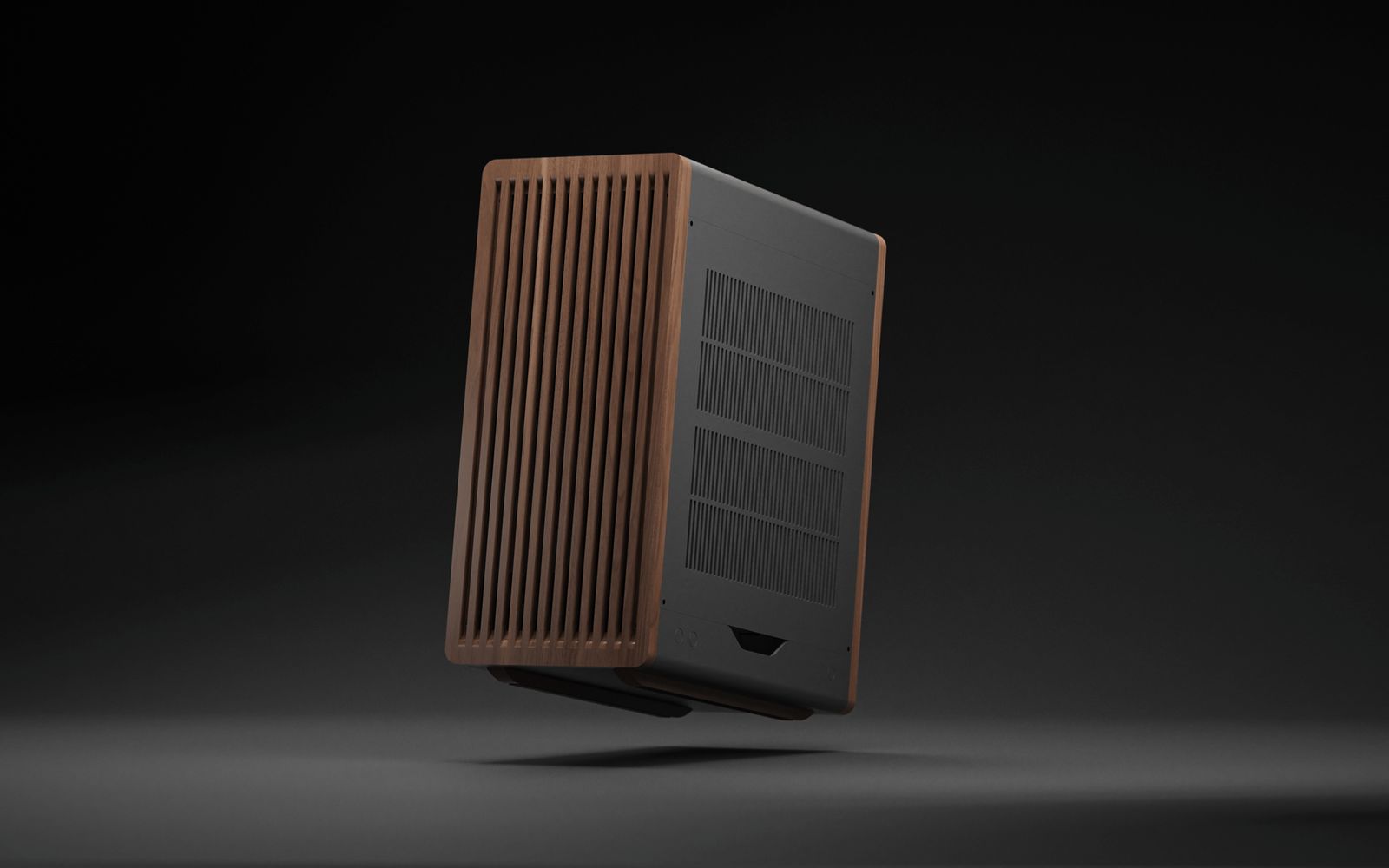 E32B computer case rear view showing ventilation grilles and walnut wood panel